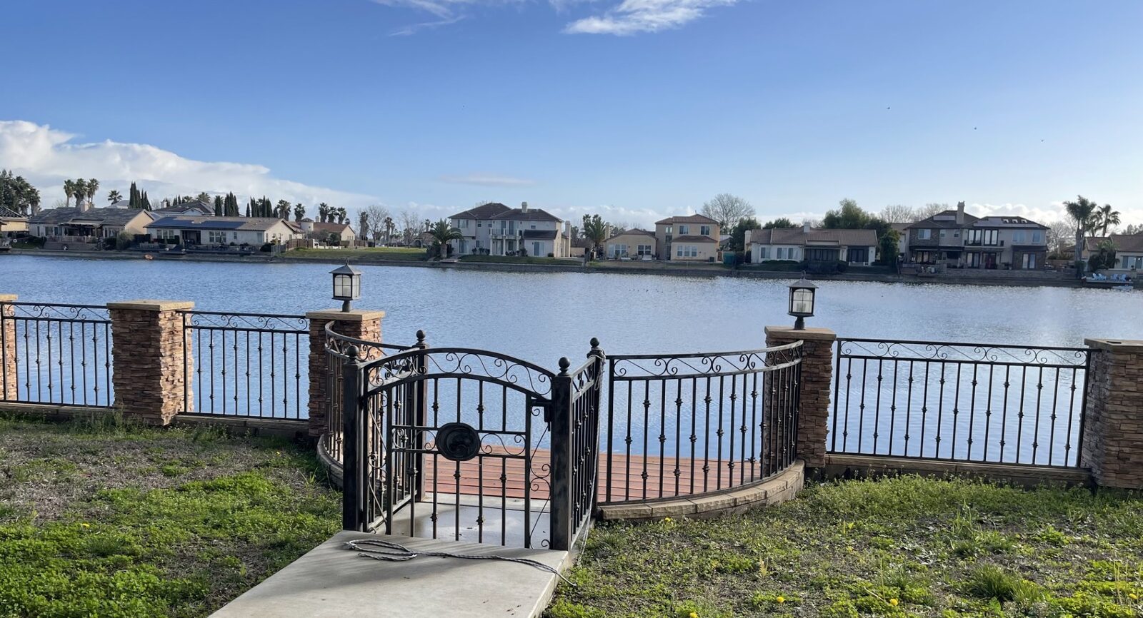 Gated waterfront property with a private dock, representing renters and property coverage